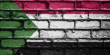 La bandiera del Sudan dipinta su un muro