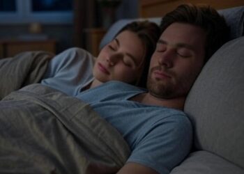 Due persone a letto che dormono