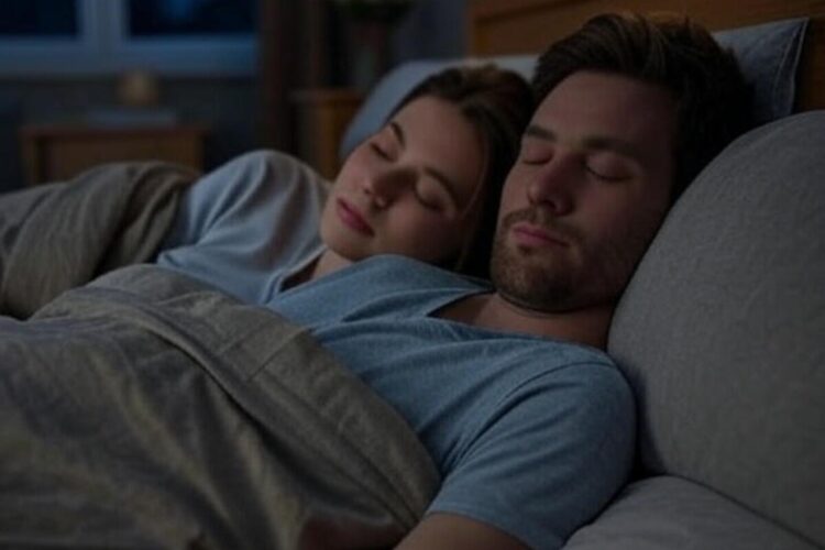 Due persone a letto che dormono