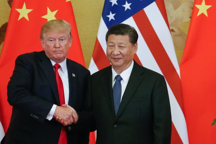 US President Trump and Chinese President Xi Jinping shake hands during a press conference at the Great Hall of the People in Beijing@ANSA