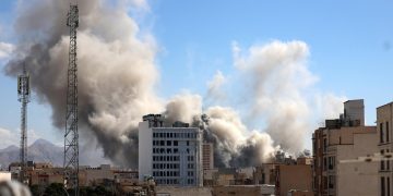 Smoke rises in central Tehran after an Israeli attack in Iran, 01 March 2026