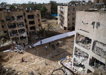 March 22, 2026 shows debris of buildings damaged after a missile strike in Arad, Israel