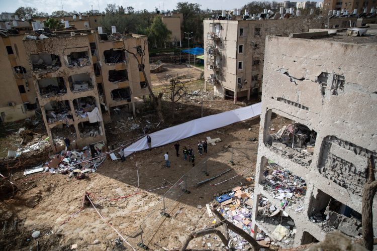March 22, 2026 shows debris of buildings damaged after a missile strike in Arad, Israel