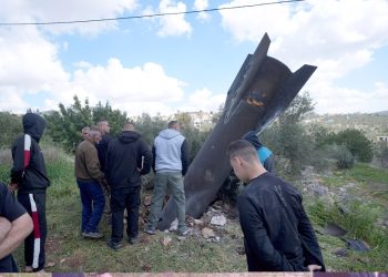 March 24, 2026, Nablus, Palestine Palestinian residents arrive to inspect the remains of an Iranian missile