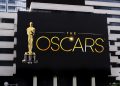 The words "Oscars"on a black LED billboard advertising