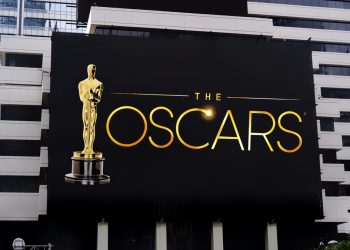 The words "Oscars"on a black LED billboard advertising