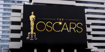 The words "Oscars"on a black LED billboard advertising