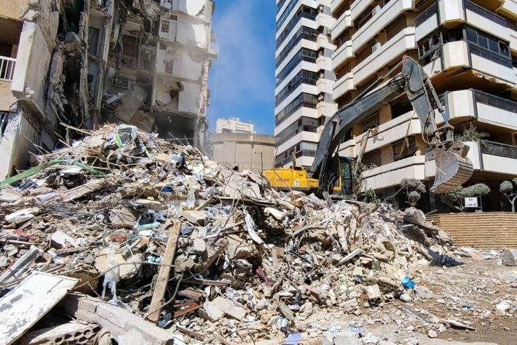 BEIRUT - APRIL 9, 2026 An excavator clears the debris after an Israeli airstrike