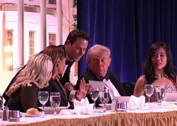 white-house-correspondents-association-dinner- Donald-Trump-sitting at a formal dinner