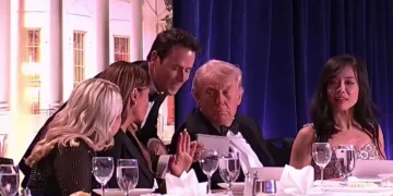 white-house-correspondents-association-dinner- Donald-Trump-sitting at a formal dinner
