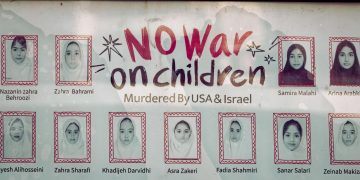 A poster with pictures of child war casualties on display on the wall of the Iranian consulate, in Shanghai, China, 30 April 2026