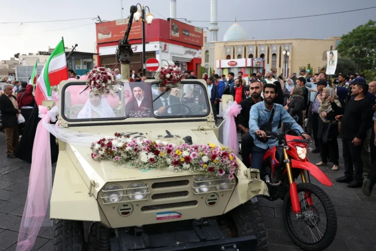 an-iranian-bride-and-groom-arrive-on-a-military-vehicle-during-a-mass-wedding-ce-1200x800.webp