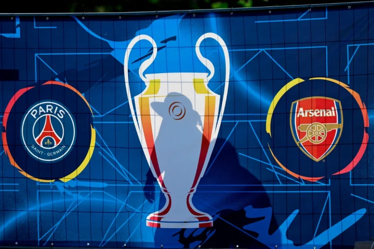 people-cast-shadows-on-banners-during-the-uefa-champions-festival-at-the-heroes--1200x800.webp