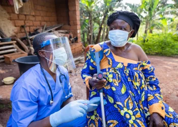 the-village-doctor-visits-a-sick-old-woman-and-gives-her-an-injection-1200x800.webp