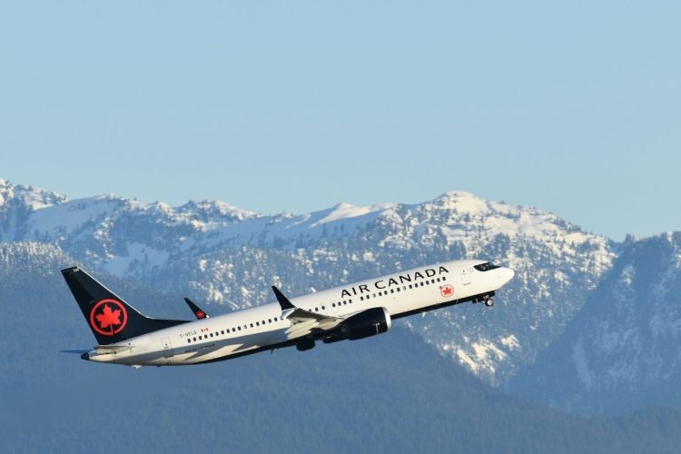 Un aereo della flotta Air Canada in volo. Uno scandalo ha recentemente colpito la compagnia