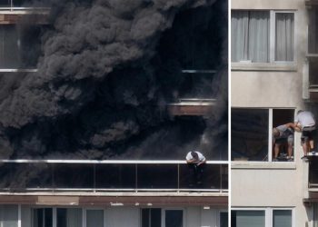 Incendio Anversa - nella foto, persone si lanciano dall'edificio in fiamme