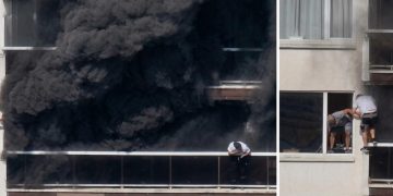 Incendio Anversa - nella foto, persone si lanciano dall'edificio in fiamme