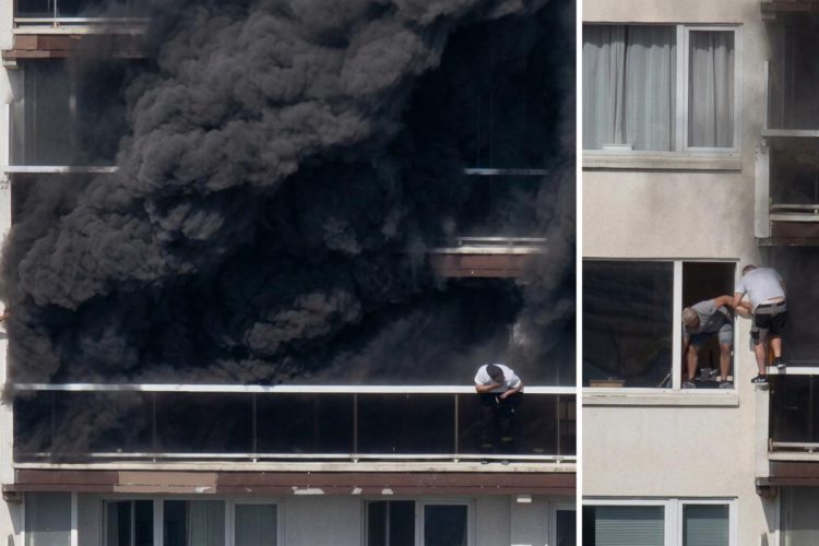Incendio Anversa - nella foto, persone si lanciano dall'edificio in fiamme