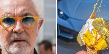 Flavio Briatore con occhiali arancioni e cono gelato lussuoso foglia oro