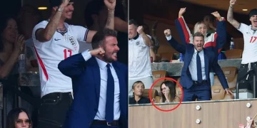 Victoria Beckham annoiata, David Beckham esultante in tribuna sportiva