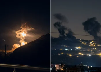 Esplosioni e fumo si alzano da colline illuminate di notte in Libano