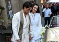 Damiano David e Dove Cameron camminano, lei tiene bouquet bianco, Montalcino.